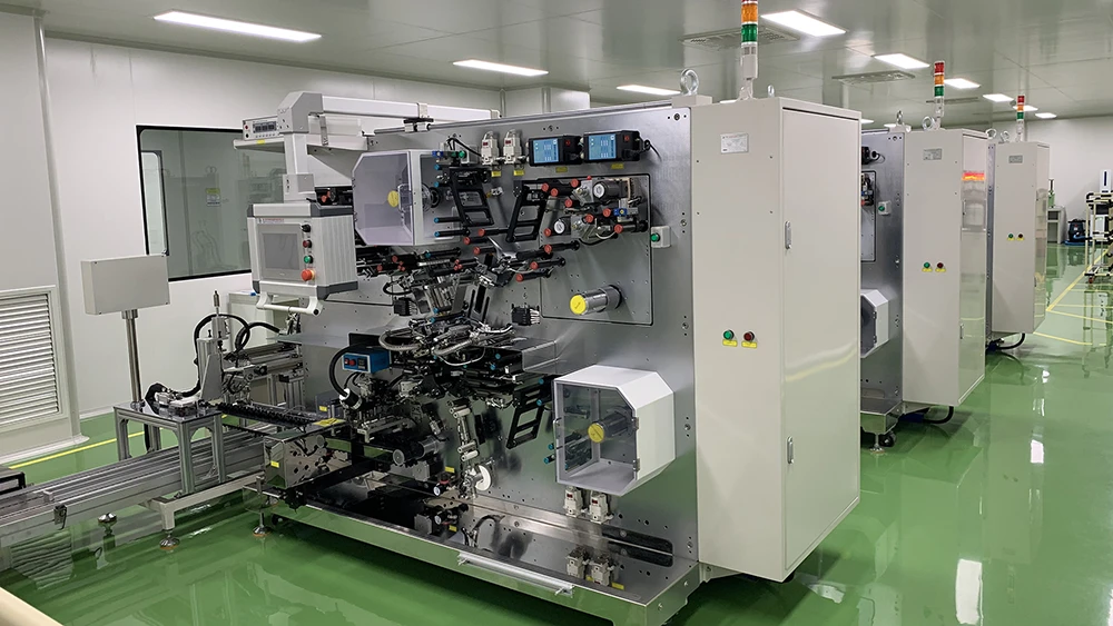 Automated cylindrical cell winding machine handling thin battery separators on a TOB New Energy turnkey line