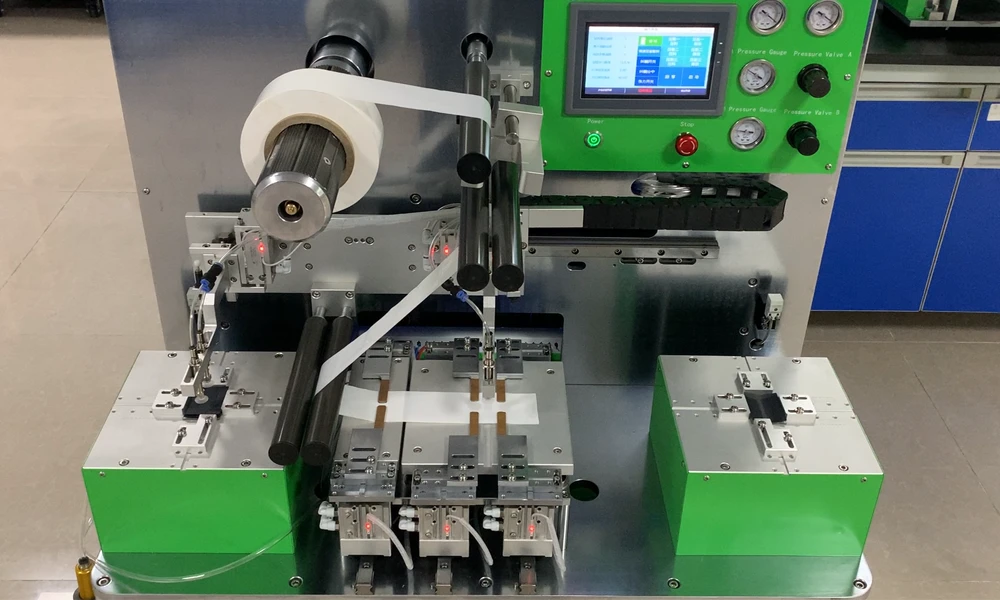 Semi-automatic pouch cell stacking machine in operation