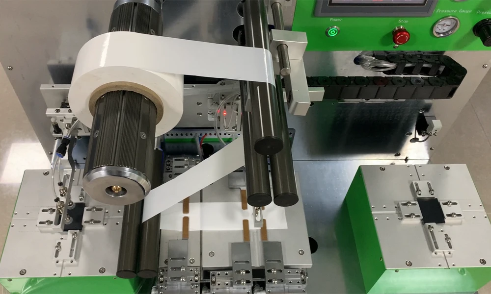 Semi-automatic pouch cell stacking with automatic separator alignment Semi-automatic pouch cell stacking with automatic separator alignment