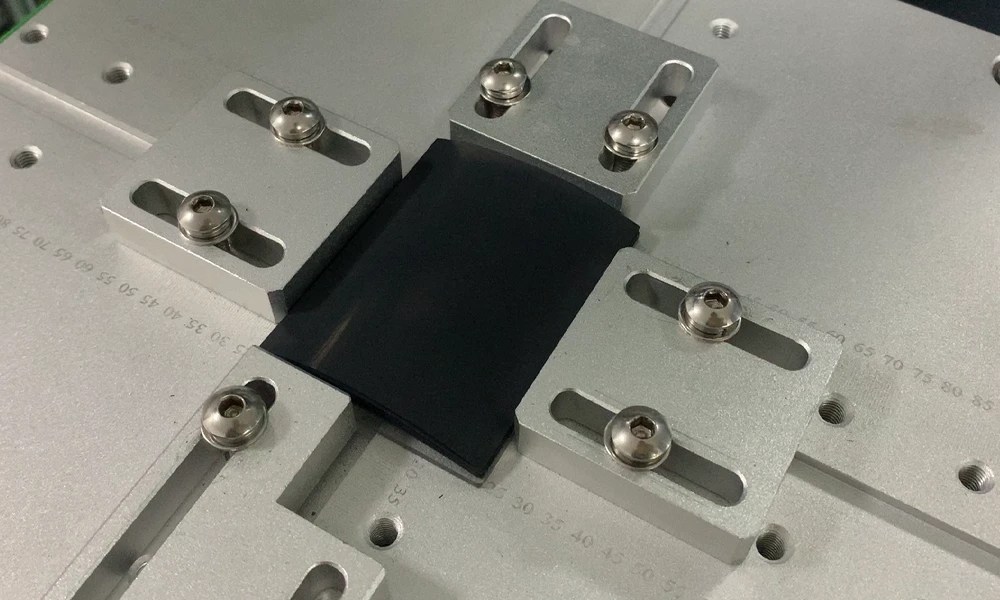 Position limiters for anode and cathode sheets in battery stacking Position limiters for anode and cathode sheets in battery stacking